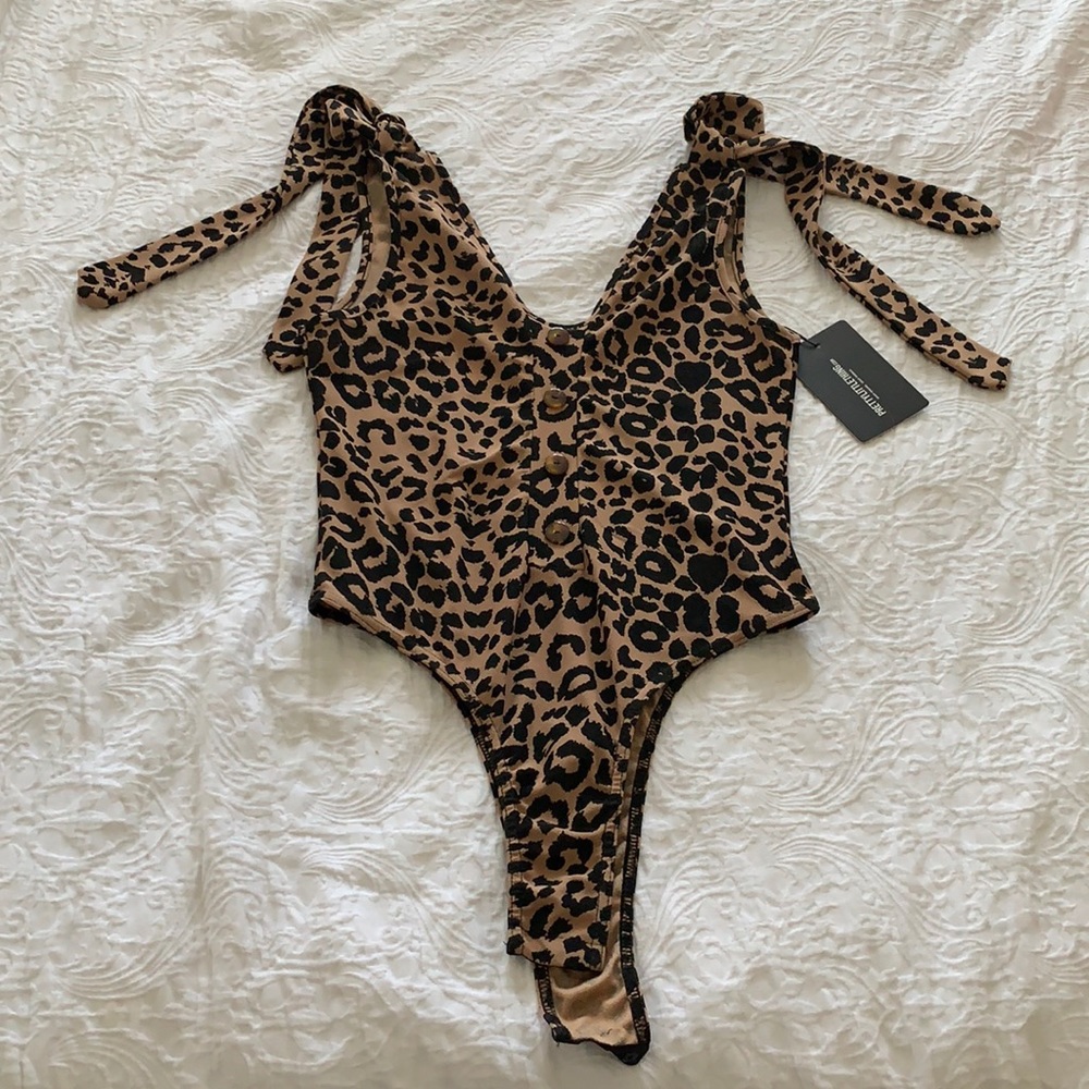 Leopard Print Bodysuit with tags never worn